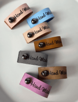 Бирка кожаная с кнопкой "НМ" от  - купить по отличной цене!