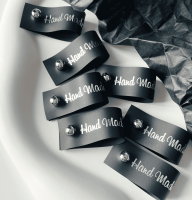 Бирка силиконовая черная с кнопкой "НМ" от  - купить по отличной цене!